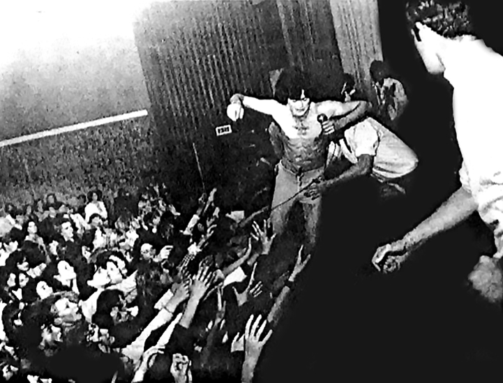 Live and mobbed by fans